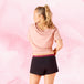 Woman wearing PJ Pants Overnight Sleepwear, showcasing stylish, protective period underwear designed for comfort and leak-free sleep in any position.