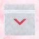 Laundry bag with a red arrow design, crafted from protective mesh material, featuring a secure zipper for washing delicate period underwear safely.