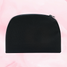 Travel bag designed for storing essentials, features a compact, durable design, ideal for travel or gym use, visible as a sleek black accessory.