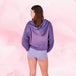 Person wearing Teens Boxer Heavy hoodie and shorts, back view.