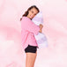 Teen in Teens Sleepwear Boxer Overnight with striped pillow.