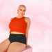 ComfortFit High Waist Moderate period pants worn by a woman sitting, showcasing the high waist design and slimline edges for discreet protection.