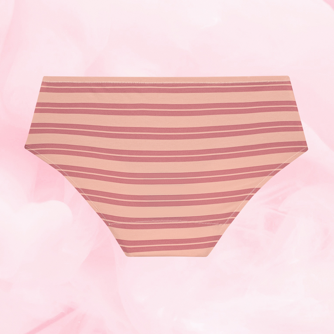 ComfortFit Essentials Hipster Light period pants featuring a striped design, high waist, and slimline edges for discreet protection, offering comfort and confidence for up to 12 hours.