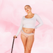 Woman wearing ComfortFit Essentials Hipster Logo Waistband period pants, showcasing a close fit and discreet protection, emphasizing comfort and reliability for up to 12 hours.