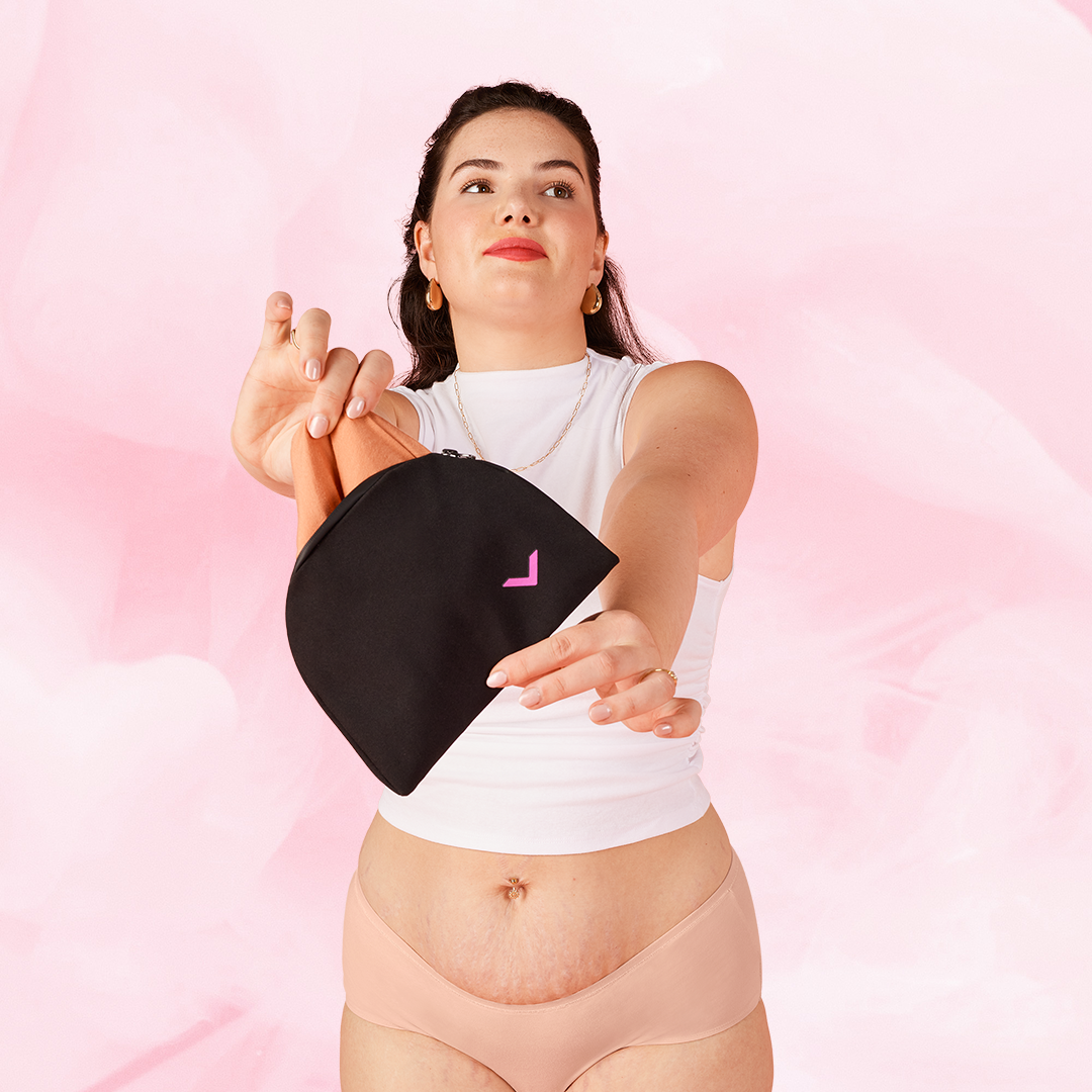 Woman holding Travel bag designed to store 2 pairs of undies, ideal for travel or everyday use, showcasing its compact, durable design.